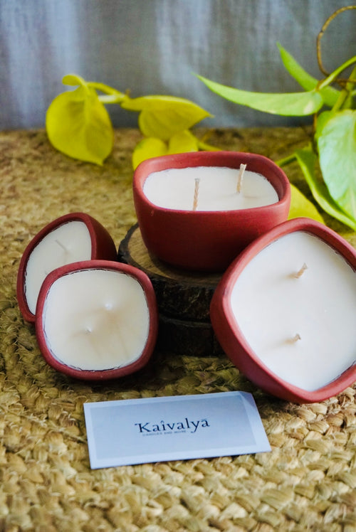 2 wick terracotta candle, square terracotta bowl candle, terracotta container candle, handmade clay candle India, dual wick candle bowl, festive terracotta candle, eco friendly candle container, Kaivalya candles